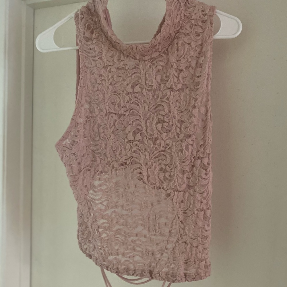 Light Pink crop top with bottom at the top